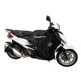Coprigambe Termoscud R224X, un coprigambe impermeabile e termico. In uso su scooter. Di TUCANO URBANO.